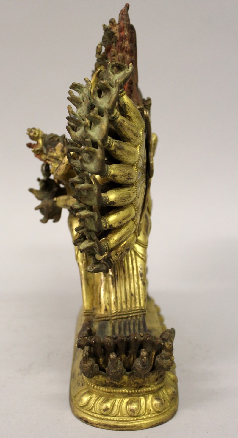 A GOOD QUALITY CHINESE SECTIONAL GILT BRONZE GROUP OF HAGAGRIVA & HIS CONSORT, the deity supported - Image 6 of 9