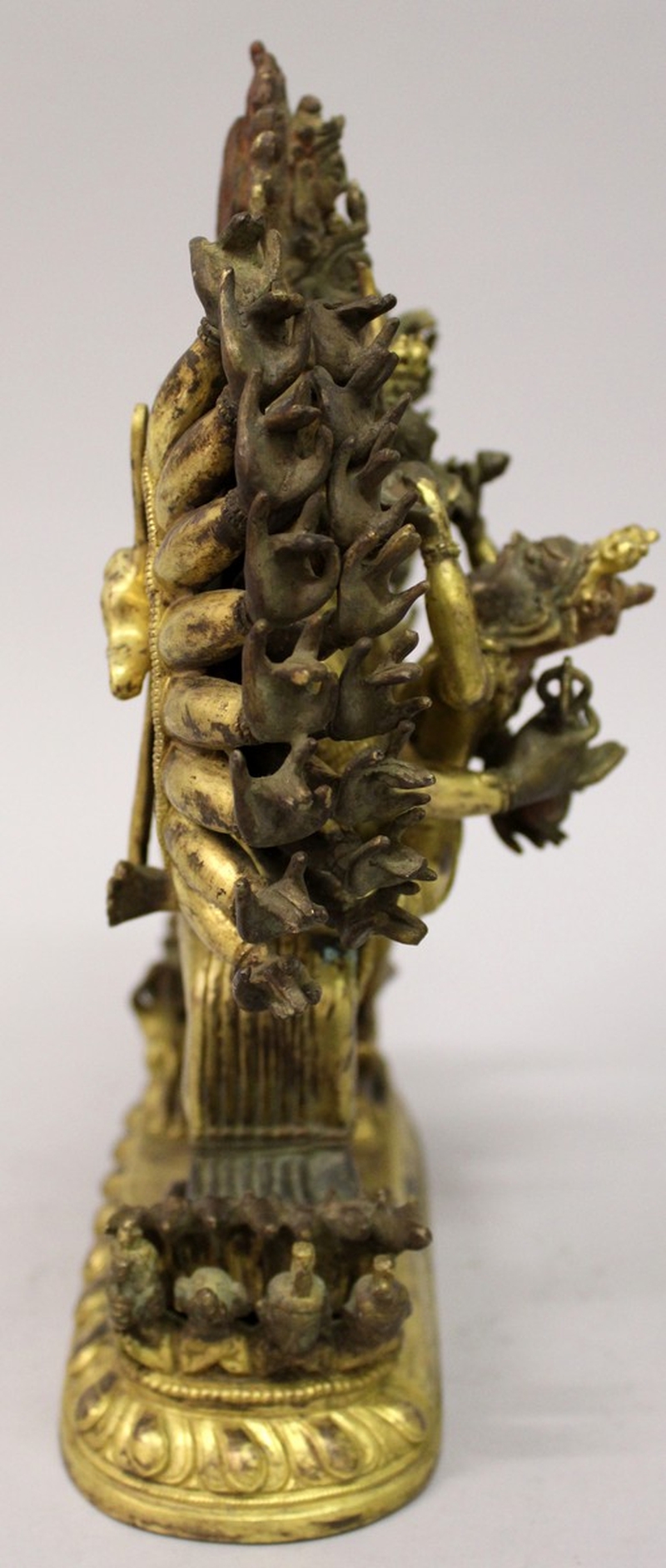 A GOOD QUALITY CHINESE SECTIONAL GILT BRONZE GROUP OF HAGAGRIVA & HIS CONSORT, the deity supported - Image 8 of 9