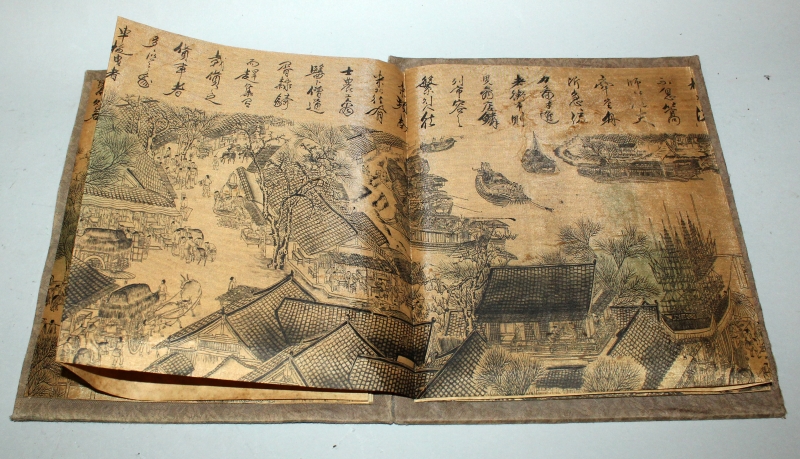 A CHINESE PICTURE BOOK, with fabric covers, opening to reveal a long folding continuous scene on - Image 7 of 10