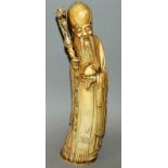 A GOOD LARGE 19TH/20TH CENTURY CHINESE STAINED IVORY FIGURE OF SHOU LAO, standing with a dragon-