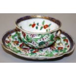 AN 18TH CENTURY CHINESE QIANLONG PERIOD CLOBBERED & MOULDED QUATREFOIL PORCELAIN TEABOWL & SAUCER,