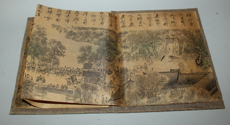 A CHINESE PICTURE BOOK, with fabric covers, opening to reveal a long folding continuous scene on - Image 8 of 10