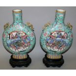 A GOOD LARGE PAIR OF 19TH CENTURY CHINESE CANTON FAMILLE ROSE PORCELAIN MOON FLASKS, together with