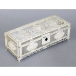 A 19TH CENTURY CHINESE CANTON IVORY CASKET, the hinged cover and sides carved with barbed quatrefoil