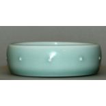 A SMALL GOOD QUALITY CHINESE CELADON PORCELAIN BRUSHWASHER, the interior decorated with an