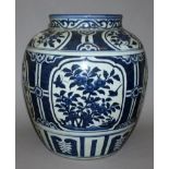 A GOOD LARGE CHINESE WANLI PERIOD BLUE & WHITE PORCELAIN JAR, circa 1600, the sides painted with