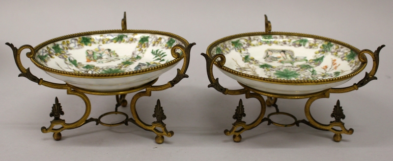 A PAIR OF LATE 19TH CENTURY CHINESE FAMILLE VERTE PORCELAIN DISHES, in the form of a pair of saucers