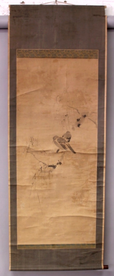 AN ORIENTAL HANGING SCROLL PAINTING ON PAPER, painted with an artist's seal and two birds perched on