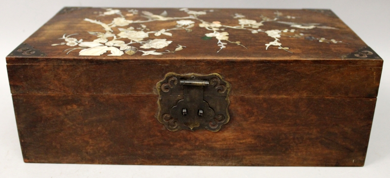 A 19TH CENTURY CHINESE INLAID RECTANGULAR WOOD BOX, the hinged cover inlaid in mother-of-pearl and