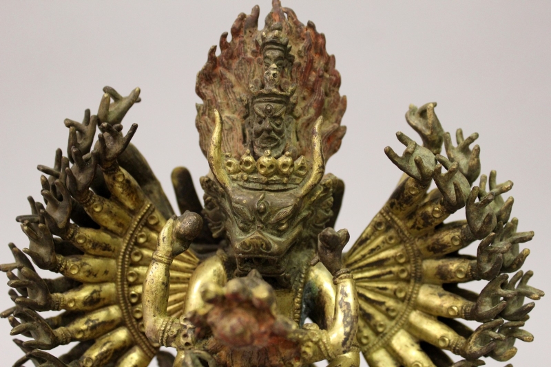 A GOOD QUALITY CHINESE SECTIONAL GILT BRONZE GROUP OF HAGAGRIVA & HIS CONSORT, the deity supported - Image 2 of 9