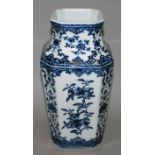 A CHINESE BLUE & WHITE MING STYLE PORCELAIN VASE, the sides of the chamfered square-section body