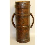 A MILITARY LEATHER BOUND SHELL CARRIER with handles, stamped JAN Arrow 11. 28ins high