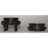 FOUR CHINESE CIRCULAR STANDS, 3ins and 2.25ins diameter.