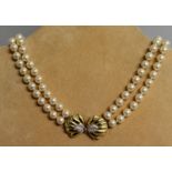 A GOOD CULTURED PEARL DOUBLE STRING NECKLACE with 106 pearls, with 18ct yellow gold and diamond