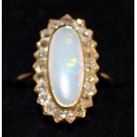 A LARGE OPAL AND DIAMOND CLUSTER RING, set in 18ct yellow gold.