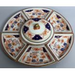 A GOOD CHINESE PORCELAIN HORS D'OEUVRES SET, comprising circular bowl and cover and six dishes.