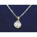 A SINGLE STONE DIAMOND PENDANT of approx. 1.6ct, set in 18ct white gold, on a chain.