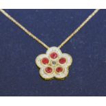 A RUBY AND DIAMOND PENDANT, set in 18ct yellow gold, with chain.