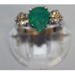 A GOOD PEAR SHAPED EMERALD FLANKED BY DIAMONDS, set in 18ct white gold.