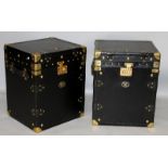 A PAIR OF BRASS BOUND BLACK LEATHER CLOTH TRUNKS, with applied military armorial's. 1ft 6ins wide