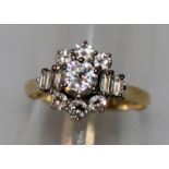 A GOOD DIAMOND CLUSTER RING set in yellow gold.