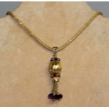 A GOOD 18CT YELLOW GOLD NECKLACE with amethyst drops.