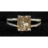 A SUPERB NATURAL YELLOW DIAMOND SINGLE STONE RING, approx 3.15cts, set in 18ct white gold.