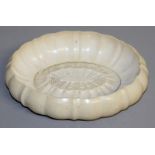 A CHINESE CARVED IVORY OVAL BRUSH WASHER. 6ins long.