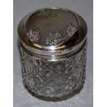 A MATCHING CUT GLASS POT with silver top. 3.25ins high. Birmingham 1926.