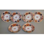 A FLIGHT BARR AND BARR PAIR OF IMARI SAUCER DISHES and four matching plates.