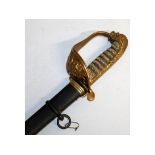 A NAVAL CUTLASS with shagreen handle and metal scabbard. 3ft 4ins long.