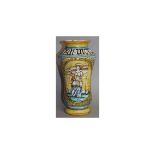 AN ITALIAN MAJOLICA DRUG JAR, painted with an oval portrait of a saint, on a yellow background.