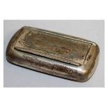 A CONTINENTAL SILVER ENGRAVED SNUFF BOX. 3.5ins long.