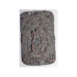 AN EARLY METAL PLAQUE, repousse with a classical scene of maidens. 5ins x 3ins.
