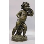 RAUGELER A SUPERB BRONZE STANDING CUPID holding a tambourine. Signed, on a circular base. 23ins