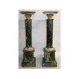 A PAIR OF GREEN MARBLE PEDESTALS with cluster columns and pedestal bases. 3ft 3ins high.