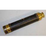 A 19TH CENTURY BRASS AND LEATHER FOLDING TELESCOPE.