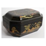 A JAPANESE BLACK LACQUER TEA CADDY with two pewter canisters and covers. 9.5ins wide.