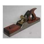 Nice steel jointer with mahogany infill, brass fittings and Marples iron. 15" long and 2¾" wide.