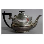 A TEAPOT with ebony finial and handle. Sheffield. Weight 24ozs.