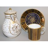 AN 18TH CENTURY PARIS PORCELAIN JUG AND COVER decorated in gold having a panel of sepia musical