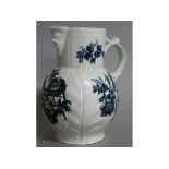 AN 18TH CENTURY WORCESTER NATURAL SPRAYS GROUP PATTERN BLUE AND WHITE MASK JUG.