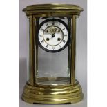 A LARGE 19TH CENTURY FRENCH BRASS OVAL FOUR GLASS CLOCK. 14ins high.