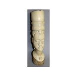 A 1920'S BELGIAN CONGO CARVED IVORY TUSK HEAD. 9.25ins high.