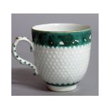 AN 18TH CENTURY RARE PINEAPPLE MOULDED COFFEE CUP with green border, anchor dagger mark to base in