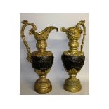 A SUPERB LARGE OF LOUIS XV DESIGN BRONZE AND ORMOLU EWERS, 2ft 10ins high, the body of bronze with a