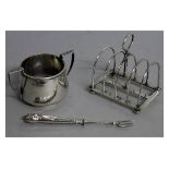 A SMALL TWO HANDLED BOWL, Sheffield 1900, a TOAST RACK, Sheffield 1923 and a FORK (3).