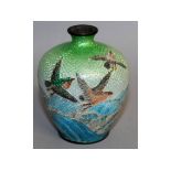 A SMALL JAPANESE CLOISONNE ENAMEL VASE decorated with flying birds. 3.5ins high.