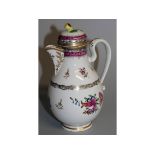 AN 18TH CENTURY VIENNA JUG AND COVER painted with flowers and a pink scale band, under-glaze blue