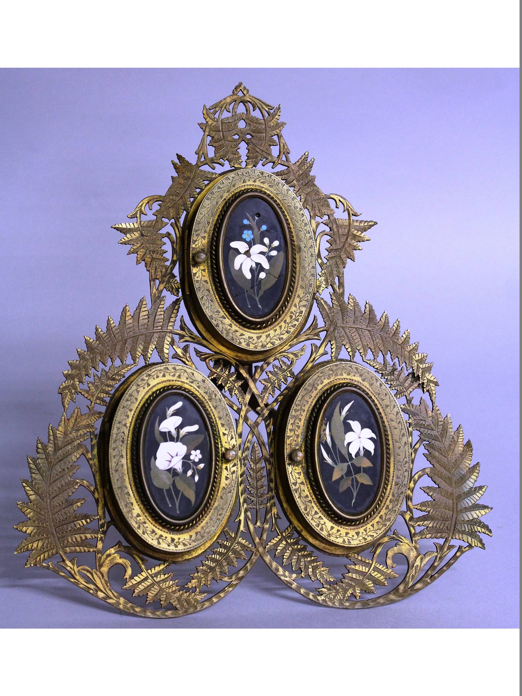 A 19TH CENTURY ITALIAN PIERCED BRASS FRAME with triple folding miniature with Pietra Dura panels